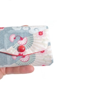 Geldbörse - Smart Wallet - Münzgeldbörse - Geldanlage - Thema Kopfhalter Himmelsfächer und rote Blumen