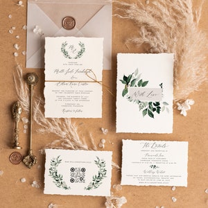 May include: Elegant wedding invitation suite with watercolor greenery and calligraphy on textured paper. Includes invitation, RSVP, details card, and a card with a QR code. The suite is tied with twine and includes a vellum envelope with a wax seal.