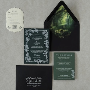 May include: A wedding invitation suite featuring a dark green card with white botanical illustrations, a matching details card, a cream RSVP card with a QR code, and black envelopes, one with a forest-themed interior lining.
