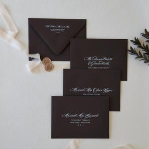 Chocolate wedding envelopes with elegant white ink guest and return address printing