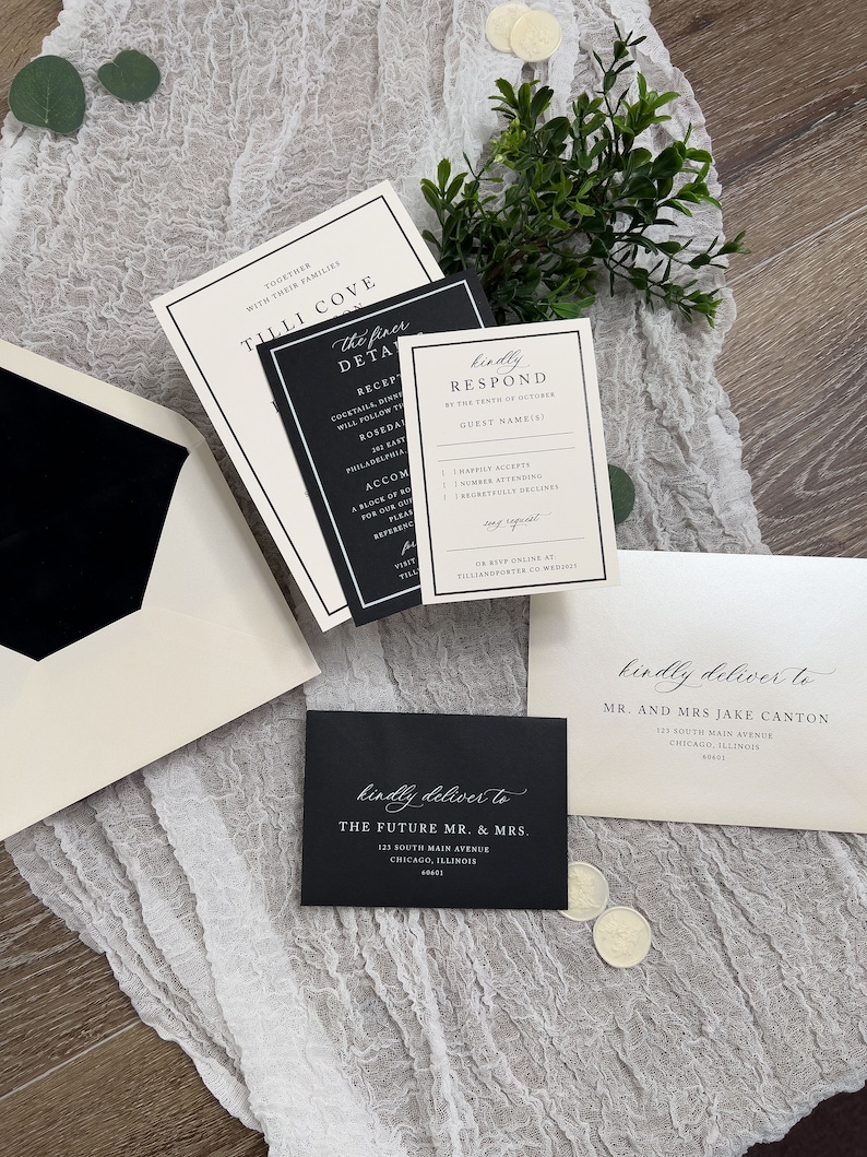 May include: Black and white wedding invitation suite with calligraphy font. The invitation card features the text "Tilli Cove" and "The finer details". The RSVP card features the text "Kindly Respond" and "Guest Name(s)". The address labels feature the text "Kindly deliver to" and the recipient's name and address.