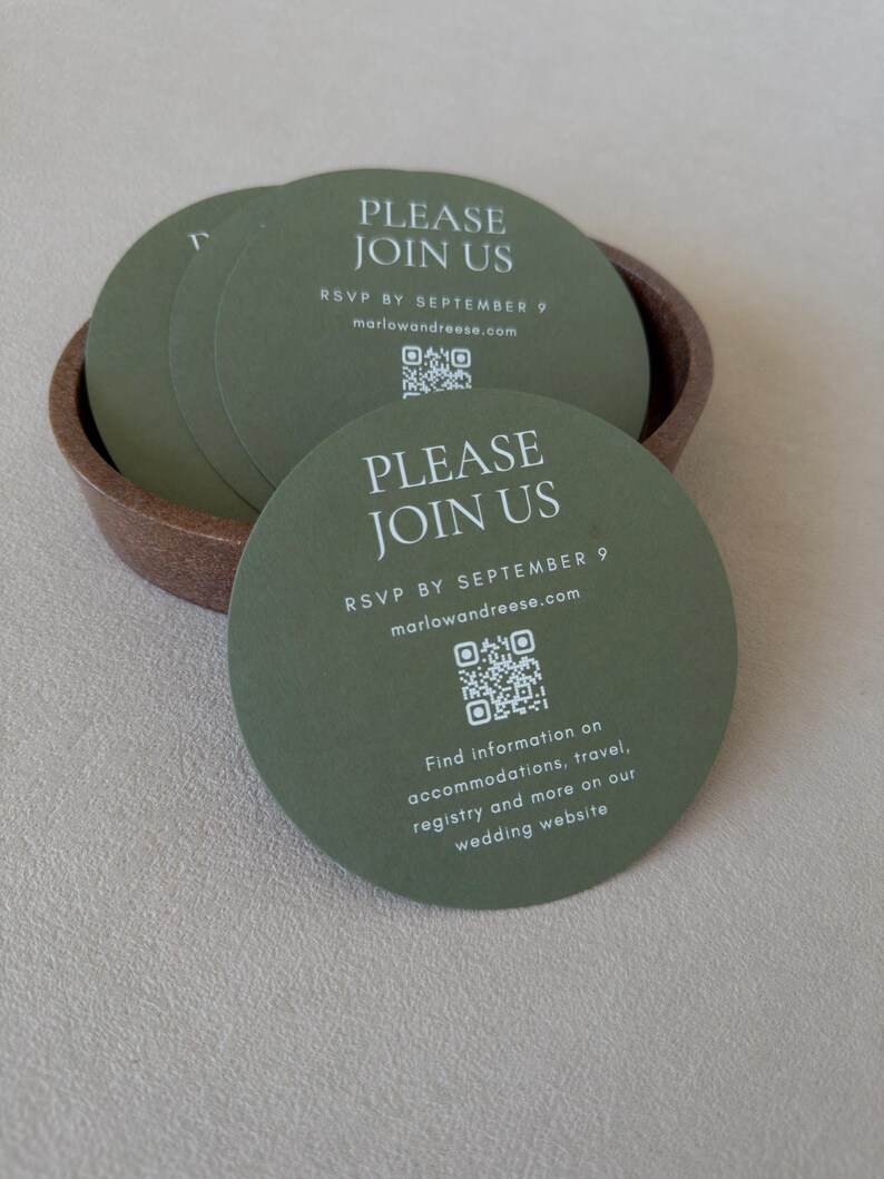 Olive green round RSVP card with QR code paired with clay wedding stationery for a modern earthy wedding invitation suite.
