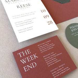 Modern clay wedding details card with ivory asymmetrical invitation and olive green round RSVP card from the Marlowe wedding stationery suite.
