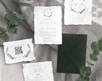 May include: Handmade wedding invitation suite with a rustic, woodland theme. The invitation features a wreath with the couple's initials and the date of the wedding. The details card includes information about the ceremony and reception. The save the date card features a wreath with the text "With Love" and the date. The cards are printed on textured paper with a deckled edge.