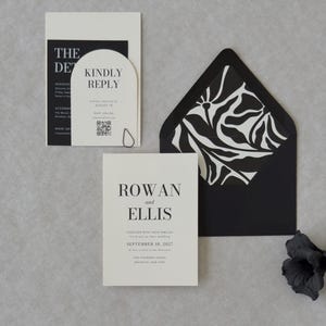 Minimalist ivory wedding invitation paired with black details card for a modern black and white wedding