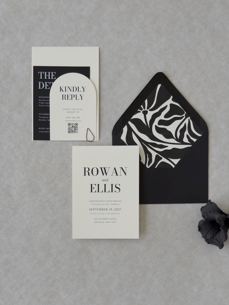 Minimalist ivory wedding invitation paired with black details card for a modern black and white wedding