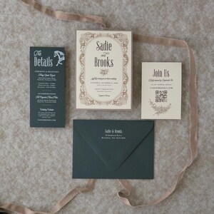 Dark green and ivory Sadie wedding stationery suite featuring an ornate bordered invitation, QR code RSVP card and coordinating envelope styled with taupe ribbon.