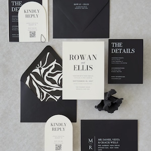 Modern black and ivory wedding invitation suite with bold typography, RSVP card and coordinating envelope liner
