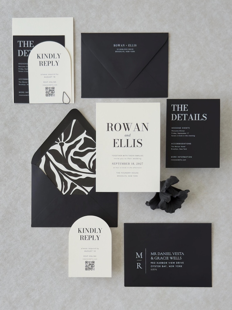 Modern black and ivory wedding invitation suite with bold typography, RSVP card and coordinating envelope liner