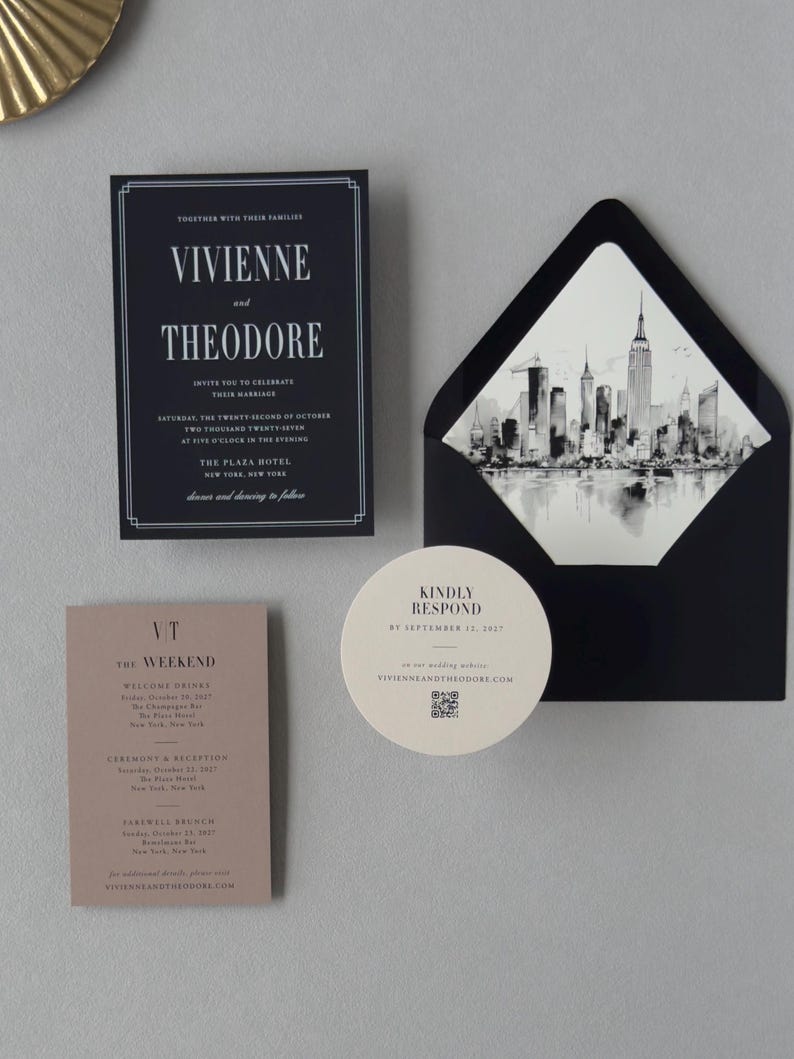 Vivienne black wedding invitation suite shown in an assembly video featuring modern black stationery, taupe details card, circular RSVP card and architectural city details.