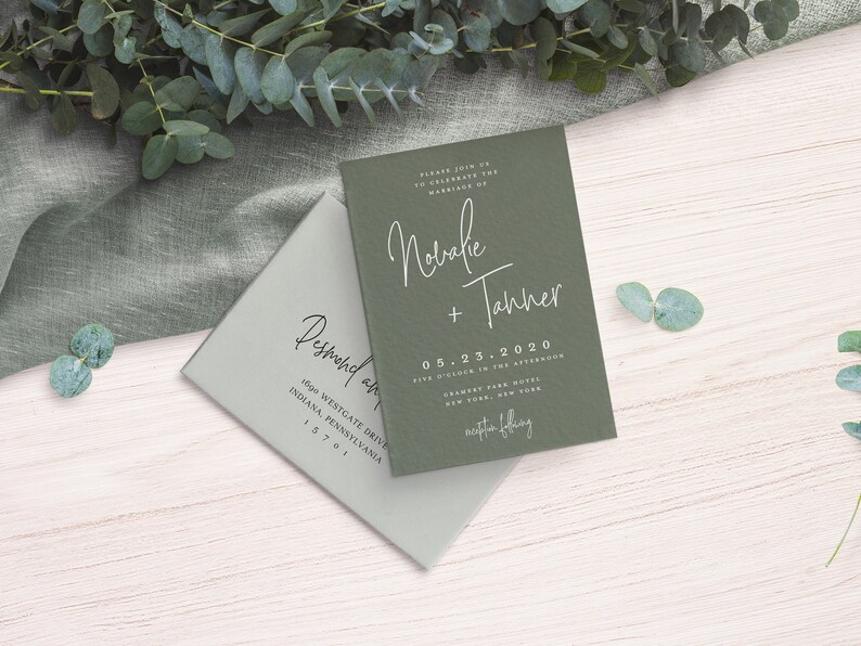 May include: Green wedding invitation with white calligraphy for the wedding of Novalie and Tanner. The date is 05.23.2020 and the time is five o'clock in the afternoon. The location is Gramercy Park Hotel in New York, New York.