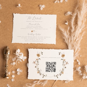 May include: A wedding invitation with a rustic, floral design. The invitation includes the details of the ceremony and reception, as well as a QR code to access the wedding website. The text on the invitation reads "The Details", "Ceremony and Reception at", "Perevals Inn", "13263 Palm St Northwest", "Cambridge, Minnesota 55008", "Cocktails at 5:30 PM", "Reception at 6:30 PM", "Wedding Website", "Please visit our wedding website for more information on travel, accommodations, registry and to RSVP online by June 26, 2023", "www.milliandethan.2023", and "www.milliandethan.2023".