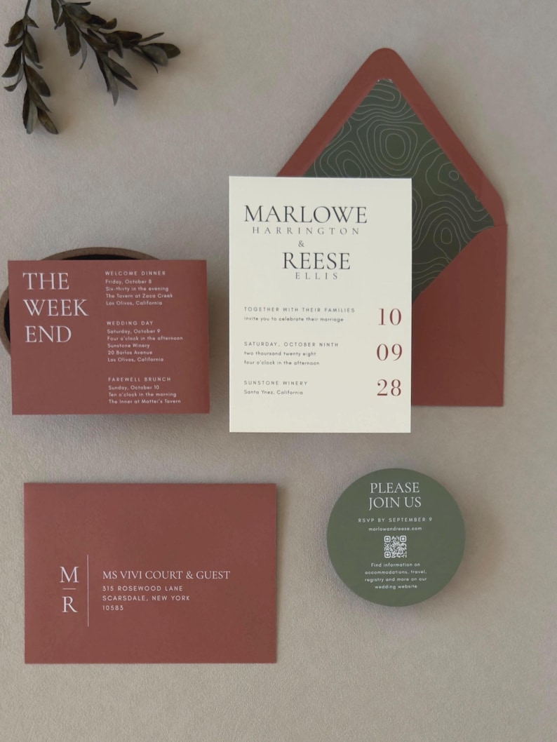 Marlowe clay and olive wedding invitation suite shown in an assembly video featuring an ivory invitation, terracotta details cards, round green RSVP card and coordinating envelope.