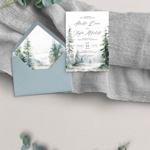 May include: A wedding invitation featuring a watercolour illustration of a woodland scene. The invitation is for Abrelle Deane and Jayler Mitchell, and it is set for 21 January 2024 at the Parkwood Inn in Springfield, Missouri.