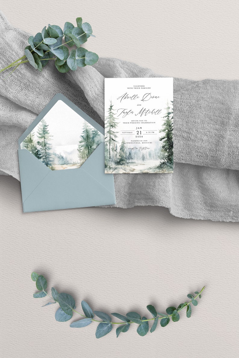 May include: A wedding invitation featuring a watercolour illustration of a woodland scene. The invitation is for Abrelle Deane and Jayler Mitchell, and it is set for 21 January 2024 at the Parkwood Inn in Springfield, Missouri.