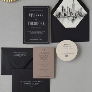 Black, taupe and ivory wedding stationery featuring an elegant invitation, rectangular details card, circular RSVP card and architectural skyline envelope liner.