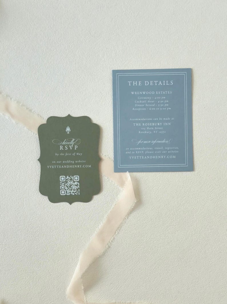 Dark green scalloped RSVP card with QR code paired with a dusty blue wedding details card from the romantic Yvette wedding invitation suite.