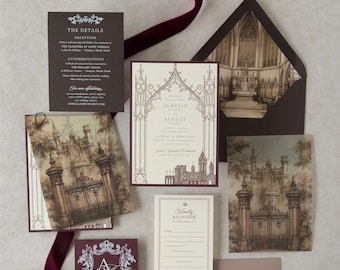 May include: A wedding invitation suite featuring a cream-colored main card with gothic arch illustrations, a dark brown details card, a response card, and envelopes. The set includes vellum overlays with gate imagery and a burgundy monogram card.