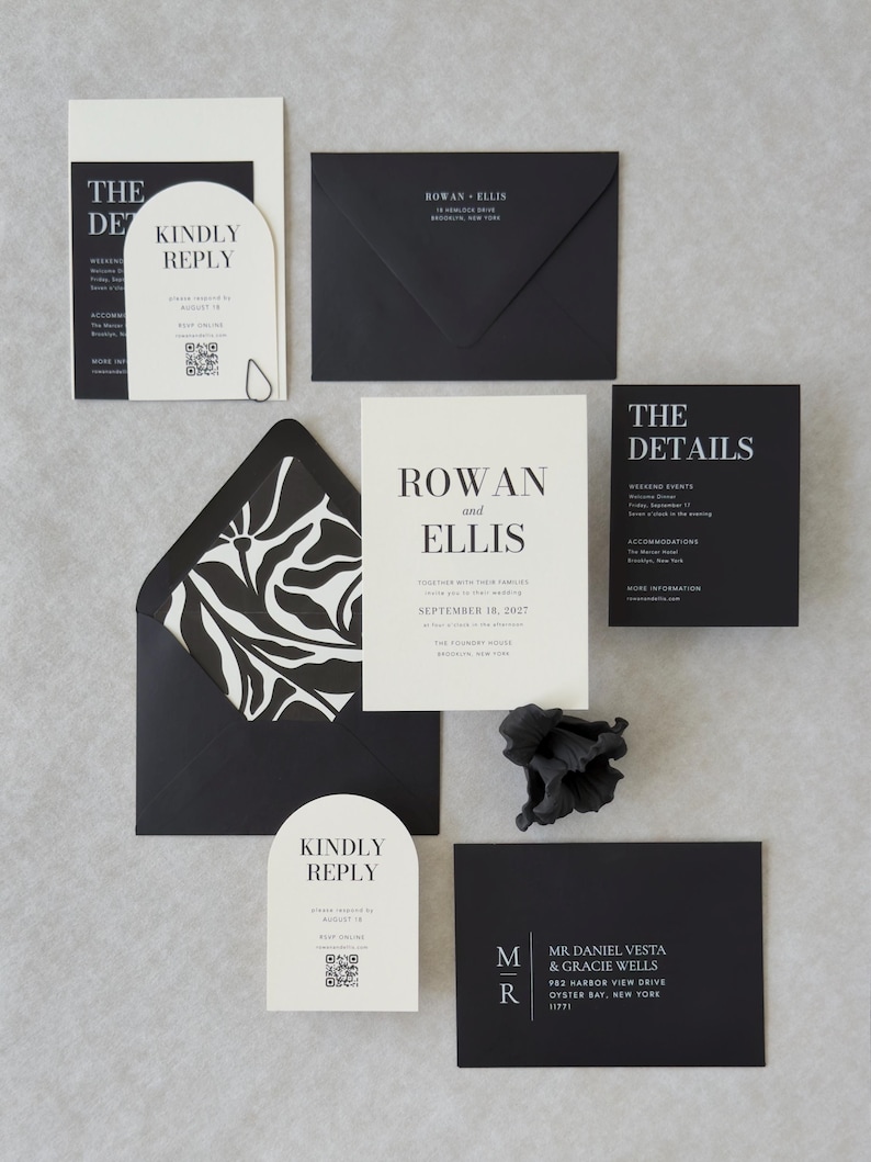 Modern black wedding invitation suite featuring bold serif typography, ivory RSVP card and coordinating stationery