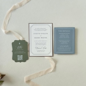 Ivory wedding invitation paired with dusty blue details card and dark green scalloped RSVP card, featuring soft landscape artwork for an elegant country wedding.