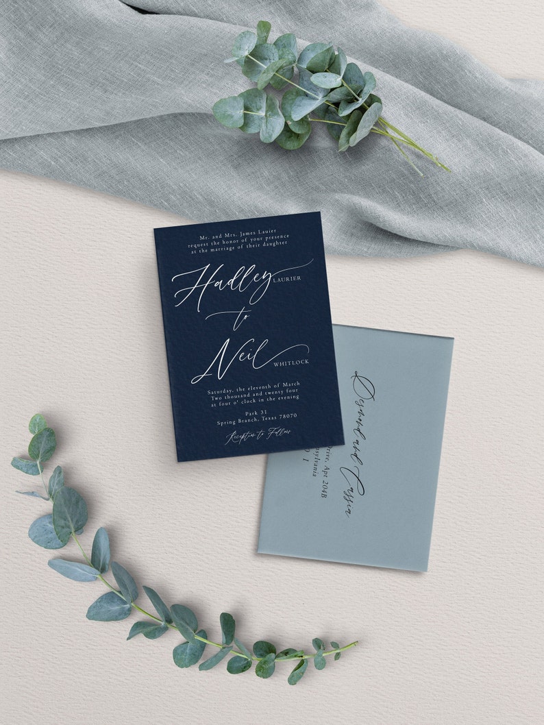 May include: A navy blue wedding invitation with white calligraphy announcing the marriage of Halley Laurier to Neil Whitlock on Saturday, March 11, 2024 at 4:00 PM. The invitation includes the location: Pack 31, Spring Branch, Texas 78070.