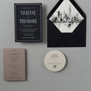 Black wedding invitation with taupe details card and ivory circular RSVP card featuring a QR code from the modern Vivienne stationery suite.