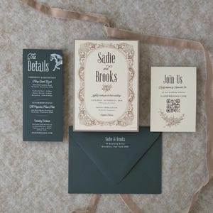 Elegant dark green and ivory wedding invitation suite featuring an ornate vintage border, green details card, QR code RSVP card and coordinating envelope.