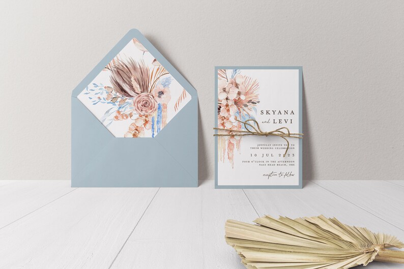 May include: A wedding invitation with a blue envelope and a white card with a watercolor floral design. The card reads "Skyana and Levi" and "10 Jul 2023".
