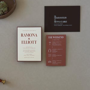 Warm ivory Ramona wedding invitation paired with terracotta details card and dark chocolate RSVP card for a modern earthy fall wedding color palette.
