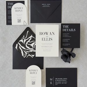 Modern black and ivory wedding invitation suite with bold typography, RSVP card and coordinating envelope liner