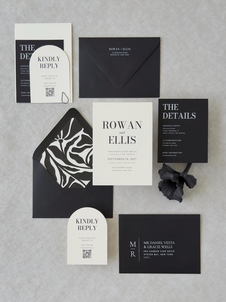 Modern black and ivory wedding invitation suite with bold typography, RSVP card and coordinating envelope liner