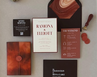 May include: A wedding invitation suite featuring a cream-coloured main card with dark red text, a dark brown envelope with a marbled liner, a response card, a weekend itinerary, an addressed envelope, a wax seal stamp, and three wax seals.