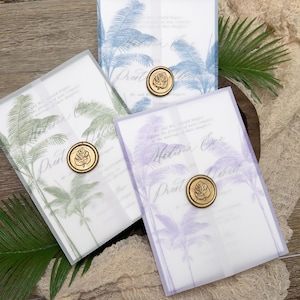 May include: Three wedding invitation suites in blue, green, and purple, each featuring a palm tree design. The invitations are sealed with a gold wax stamp. The text "Pratt" is visible on each invitation.