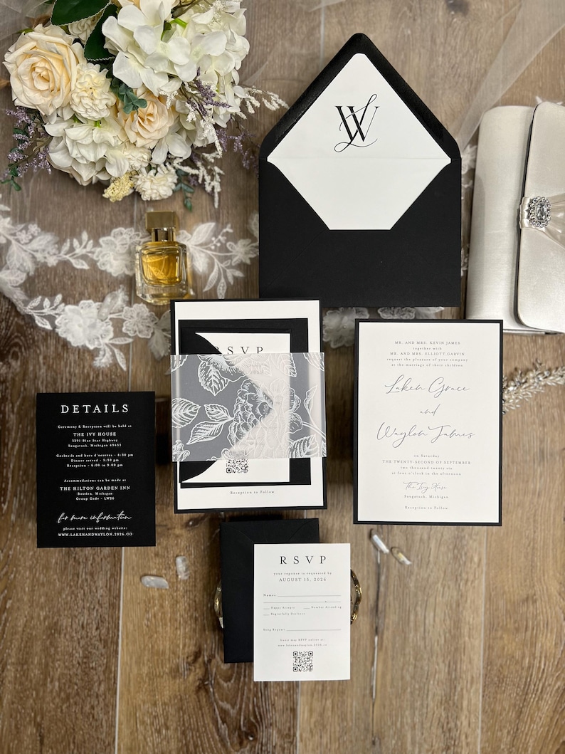 Black and white wedding invitations with classic, timeless design. Minimalist black wedding with white ink floral vellum thick band and monogram wedding logo designed for you.