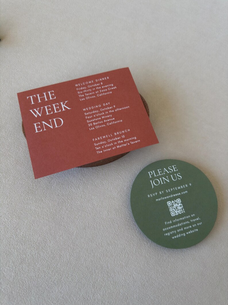 Terracotta wedding details card featuring bold ivory typography paired with the olive green QR code RSVP card from the modern Marlowe suite.