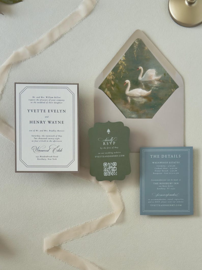 Ivory wedding invitation paired with dusty blue details card and dark green scalloped RSVP card, featuring soft landscape artwork for an elegant country wedding.