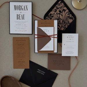 Black, brown and white Whitmore wedding invitation suite featuring layered stationery, warm neutral colors and thin ribbon for a modern editorial wedding.