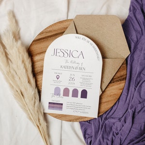 May include: A wedding invitation card with a purple and white color scheme. The card features a modern arch design with the text "Jessica The Wedding of Katelyn & Ben" and the date "June 26, 2024".