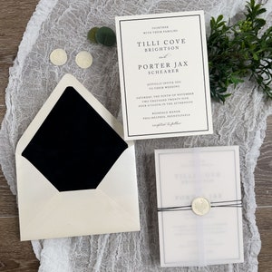 May include: A white wedding invitation with black text and a black border. The invitation announces the wedding of Tilli Cove Brightson and Porter Jax Shearer on Saturday, November 9th, 2025 at 4:00 PM at Rosedale Manor in Philadelphia, Pennsylvania. The invitation is tied with a black ribbon and sealed with a wax stamp.
