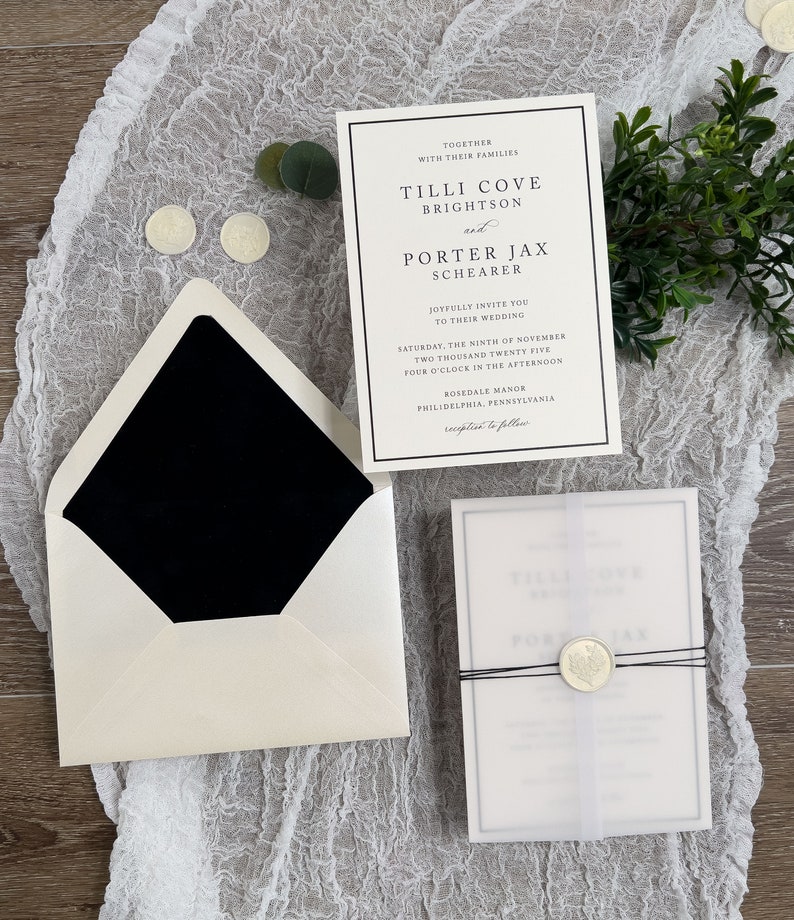May include: A white wedding invitation with black text and a black border. The invitation announces the wedding of Tilli Cove Brightson and Porter Jax Shearer on Saturday, November 9th, 2025 at 4:00 PM at Rosedale Manor in Philadelphia, Pennsylvania. The invitation is tied with a black ribbon and sealed with a wax stamp.