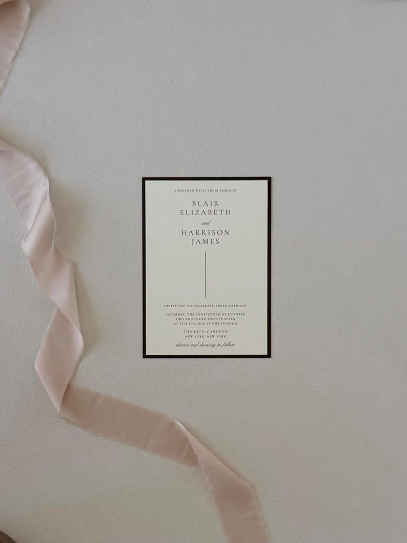 Brown and ivory Blair wedding invitation suite with monogram vellum, arch RSVP card and floral envelope liner styled in a warm romantic neutral palette.