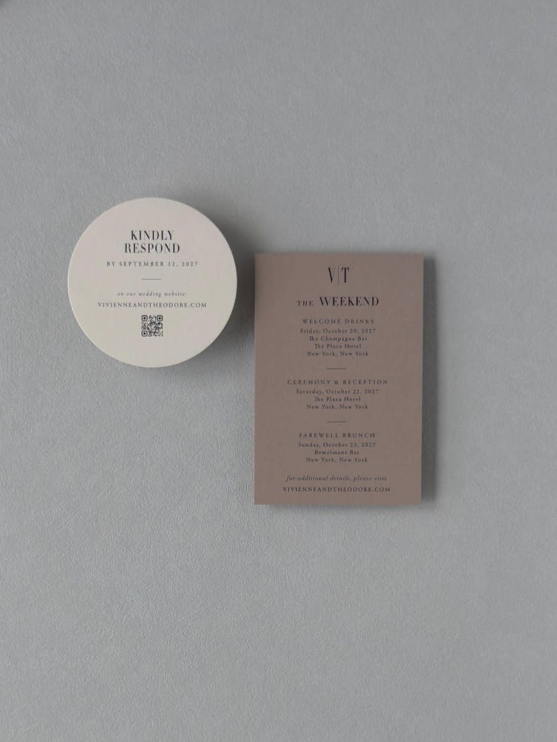 Ivory round RSVP card, taupe details card and black wedding invitation displayed with a dramatic city skyline envelope liner for a modern urban wedding.
