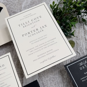 May include: A white wedding invitation with black trim and text. The invitation announces the wedding of Tilli Cove Brightson and Porter Jax Schearer on Saturday, November 9th, 2025 at 4:00 PM at Rosedale Manor in Philadelphia, Pennsylvania. The invitation includes the text "reception to follow".