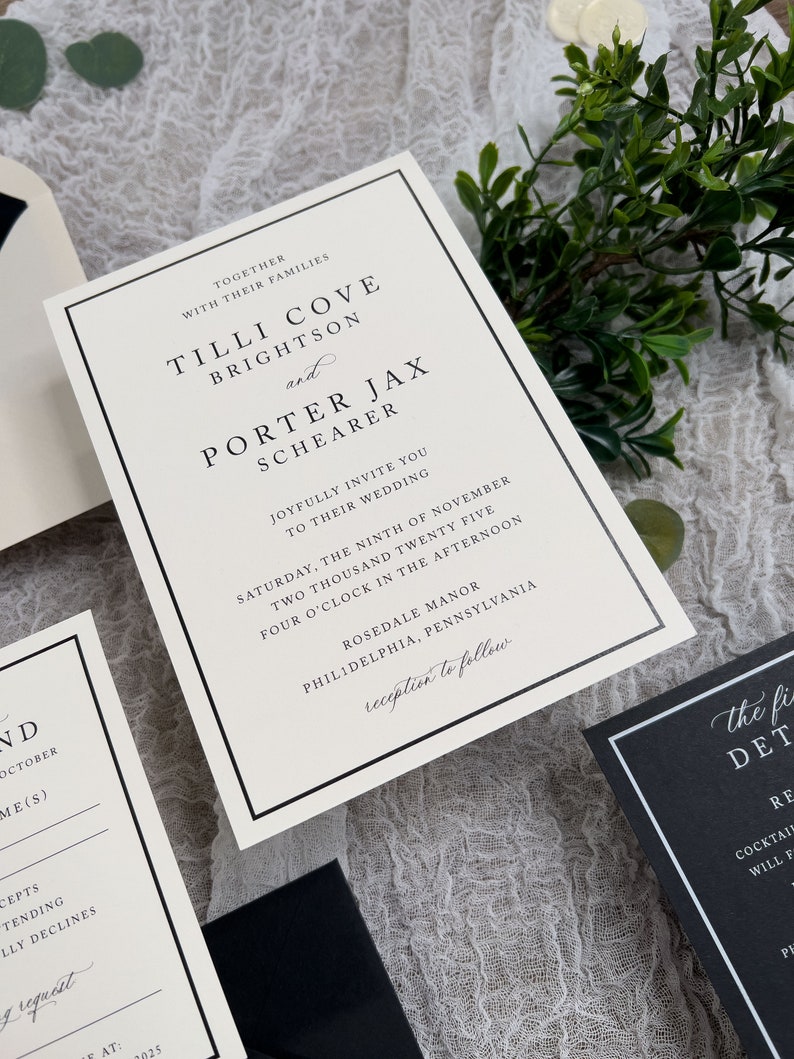 May include: A white wedding invitation with black trim and text. The invitation announces the wedding of Tilli Cove Brightson and Porter Jax Schearer on Saturday, November 9th, 2025 at 4:00 PM at Rosedale Manor in Philadelphia, Pennsylvania. The invitation includes the text "reception to follow".