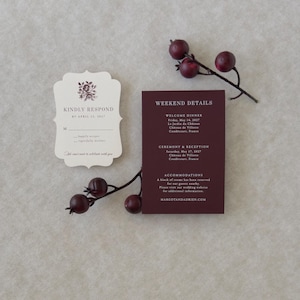 Burgundy wedding details card with dusty blue invitation and ivory scalloped RSVP card from the Margot invitation suite