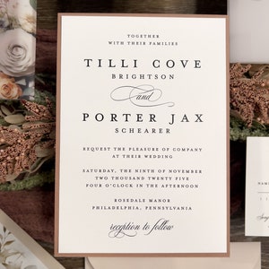 Peach and taupe botanical wedding stationery with coordinating invitation, RSVP card and elegant neutral accents.