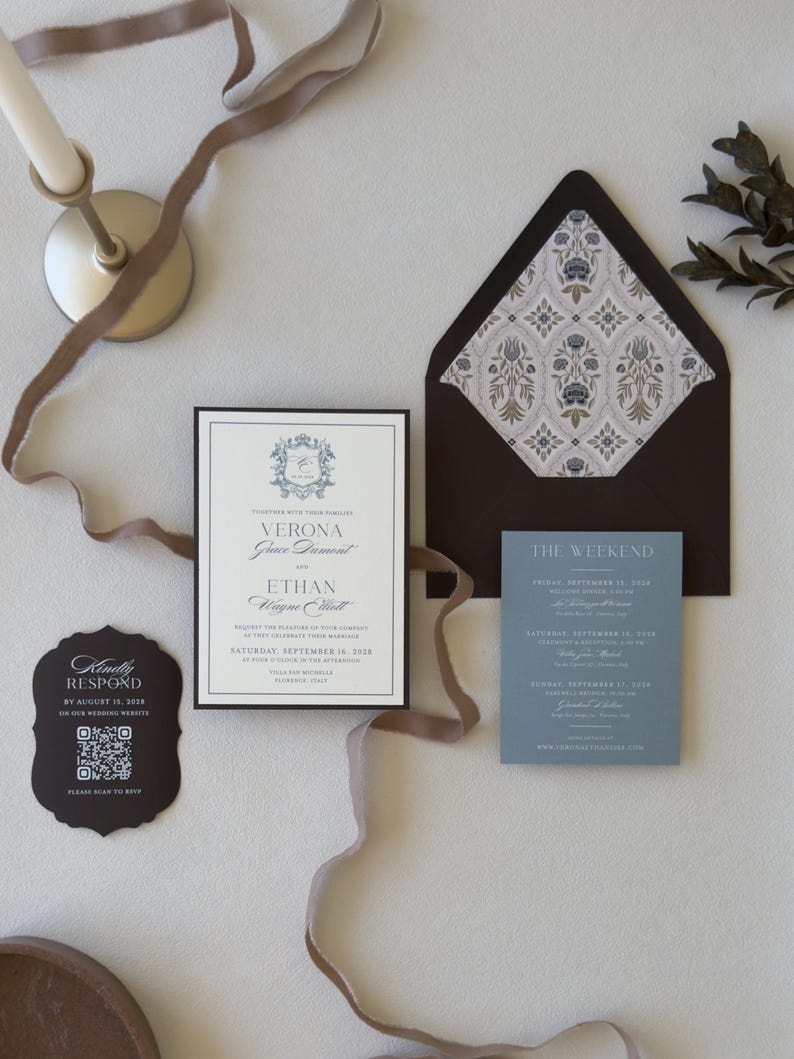 Styled Verona dusty blue wedding invitation suite with coordinating details card and wax seal