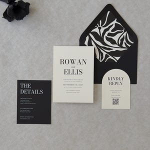 Modern ivory RSVP card with QR code displayed with black envelope and coordinating patterned envelope liner
