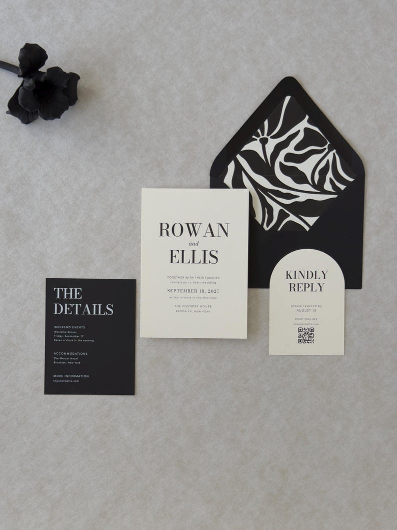 Modern ivory RSVP card with QR code displayed with black envelope and coordinating patterned envelope liner