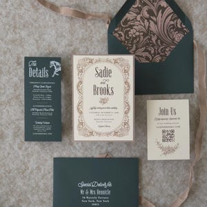 Dark green and ivory wedding invitation suite featuring ornate vintage typography, decorative borders, QR code RSVP card and rich botanical-inspired details.
